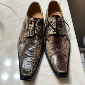 Good dress shoes in fair condition. See pictures